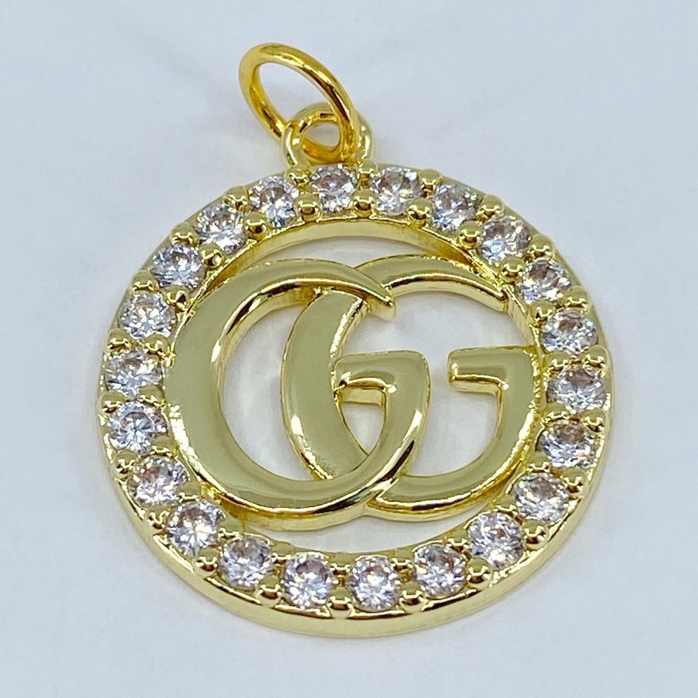 Gucci zipper pull/ pendant